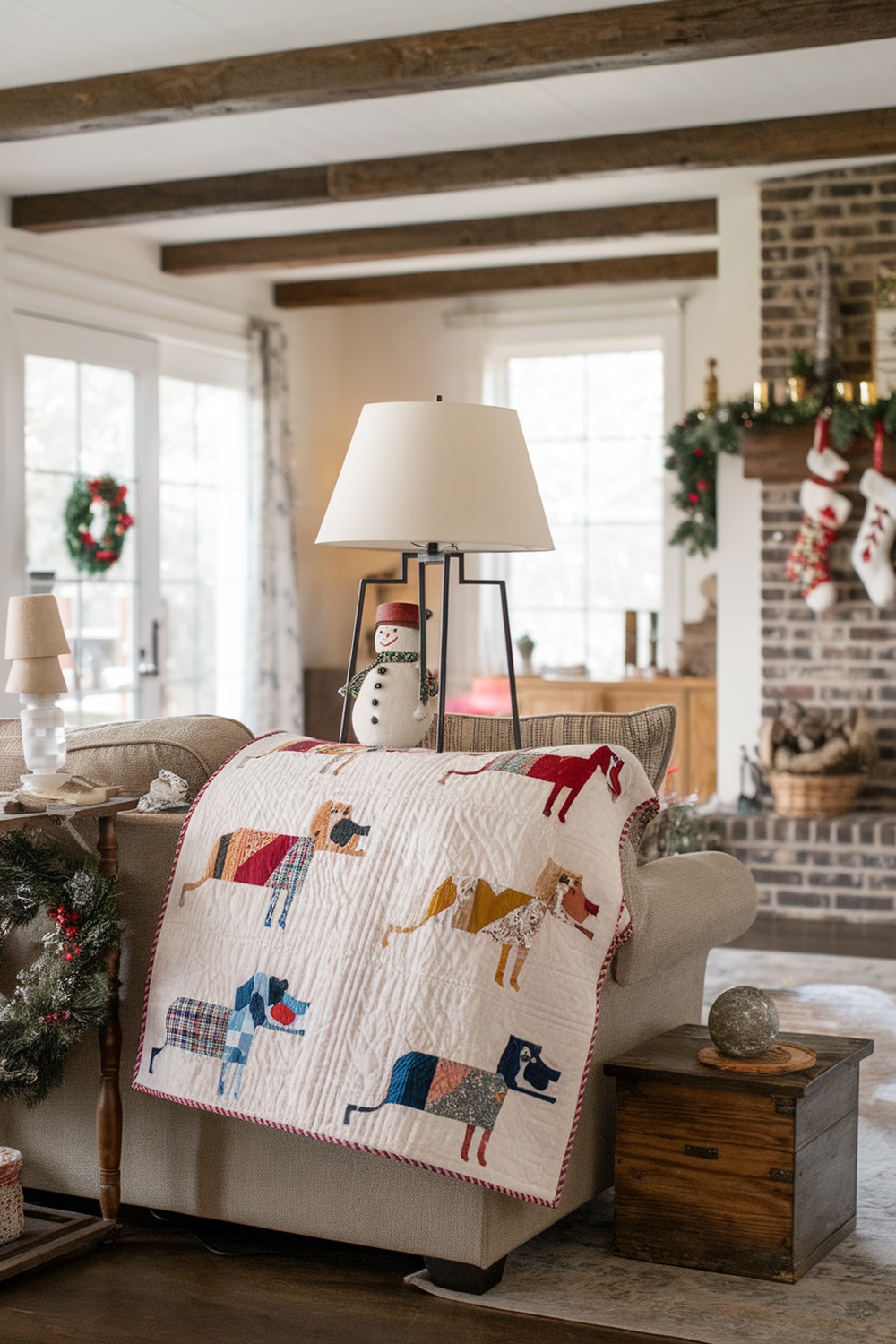 A cozy living room with a dog-themed quilt draped over a chair, decorated for Christmas.